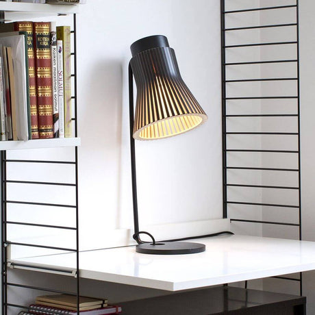 Petite 4620 wooden table lamp 56 cm on a desk, ideal for pleasant light and Scandinavian design.