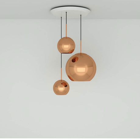 Tom Dixon Copper 3er Pendellampe Ø 78cm mit hochreflektierenden, metallischen Schirmen in warmem Kupfer.