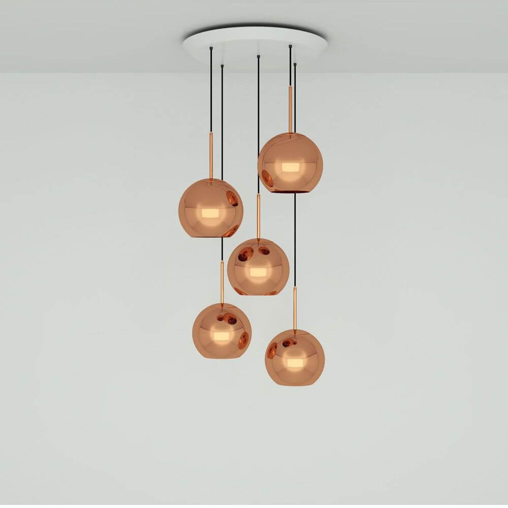 Tom Dixon Copper 5er Pendelleuchte Ø 25cm mit hochreflektierenden Kupfer-Lampenschirmen.