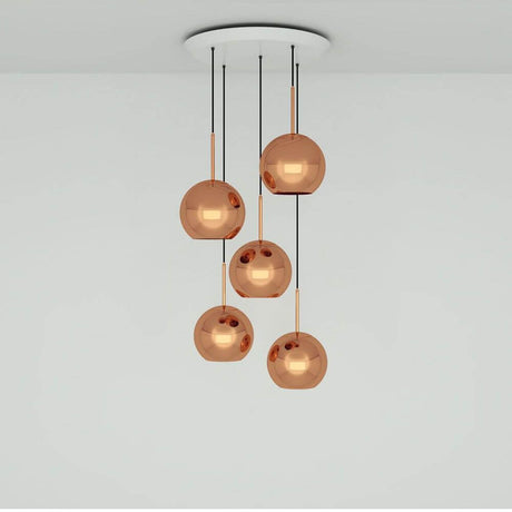 Tom Dixon Copper 5er Pendelleuchte Ø 25cm mit hochreflektierenden Kupfer-Lampenschirmen.