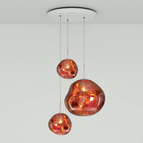 Tom Dixon Melt LED Trio Pendelleuchte 3er Mobile Ø 81cm in Kupferoptik mit schmelzendem Glas.