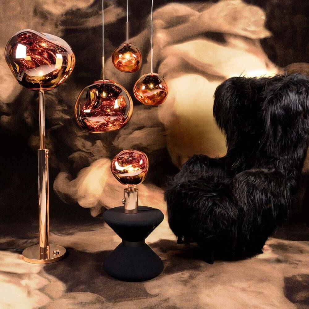 Tom Dixon Melt Tischlampe mit Dimmer in stylischer Einrichtung und beeindruckendem Lichtdesign.