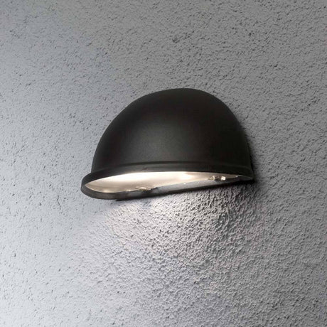 Torino Außen-Wandleuchte Schwarz, Acrylglas an grauer Wand montiert, stilvolles Außendesign.