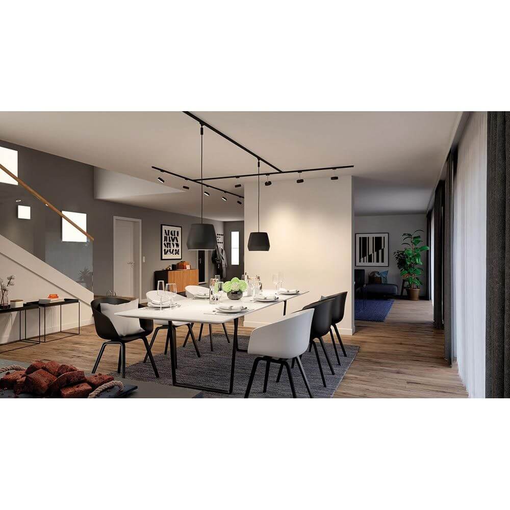 Helles Esszimmer mit U-Rail Schienenspot Blossom in Schwarz matt und Rauchglas, stilvolle Dekoration und moderne Einrichtung.