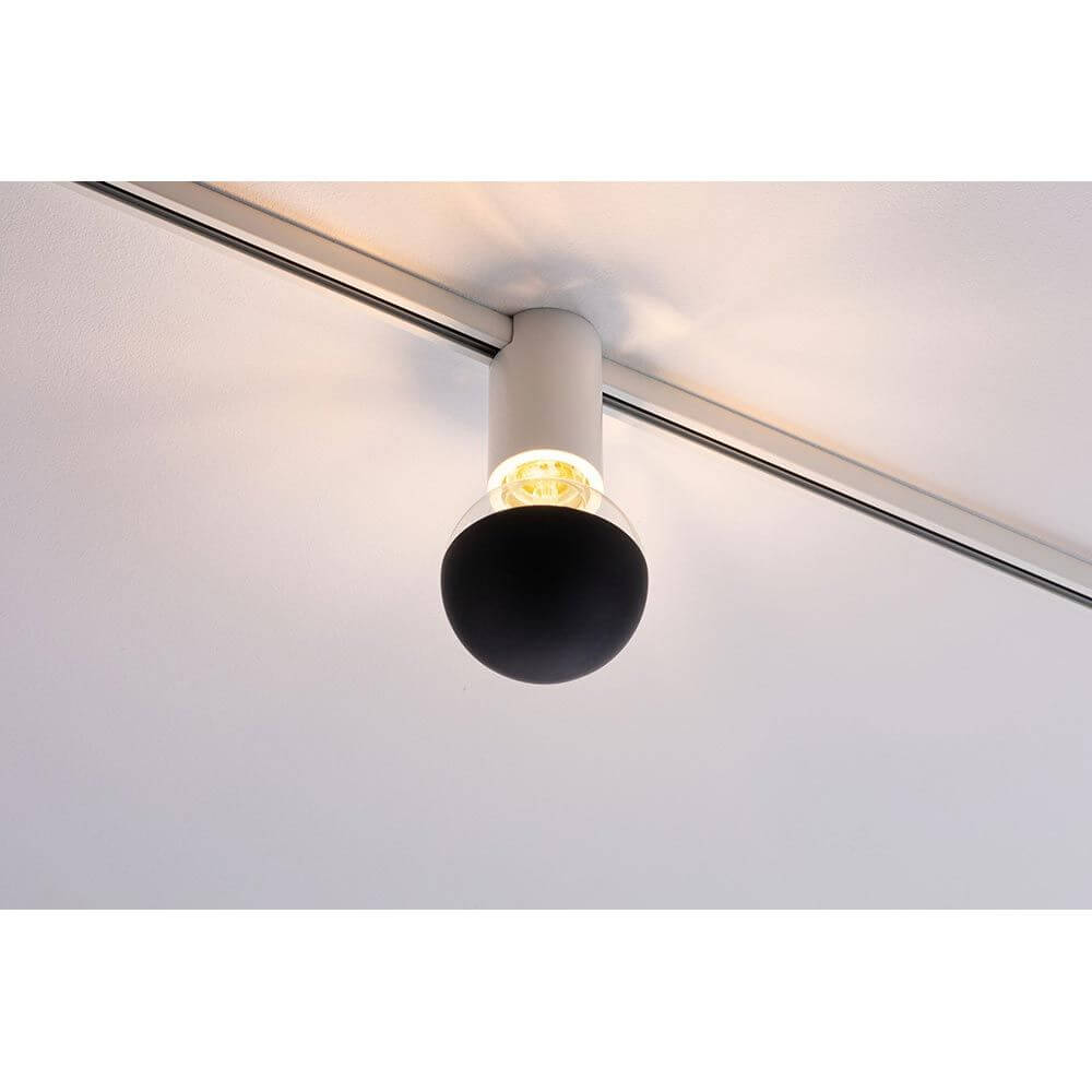U-Rail Schienenspot Socket Einzelspot Weiß an Decke montiert mit dekorativem Leuchtmittel.