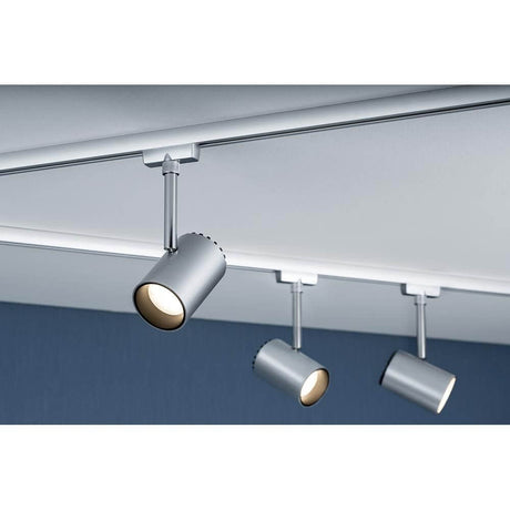 Projecteur URail LED 5W Shine 230V sur un luminaire sur rail au design moderne en argent.