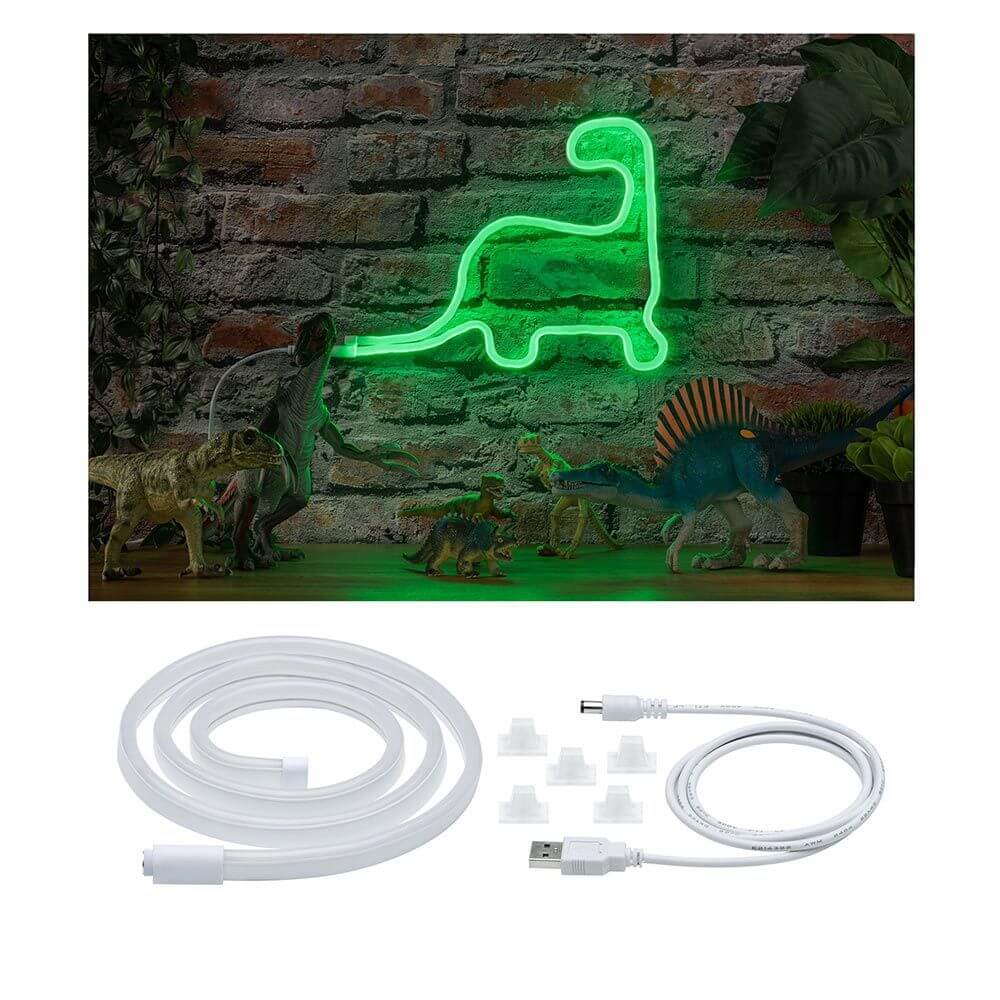 Grüner USB-LED Neonstreifen in Dinosaurierform mit Halteclips und transparentem Kabel.