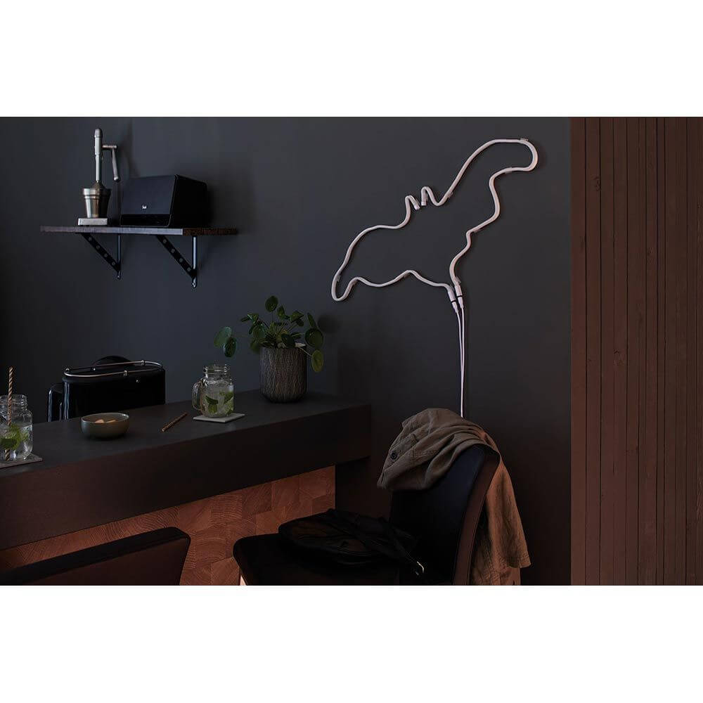 Neonlicht in Form eines Tieres, dekoriert den modernen Küchenraum mit stilvollem Design.