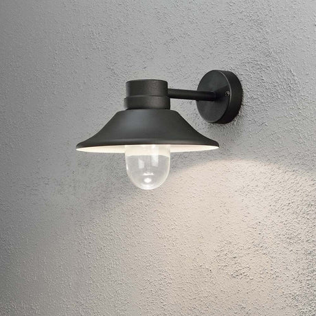 Vega LED Außen-Wandleuchte 700lm , 3000K Schwarz, klares Glas an einer Wand montiert