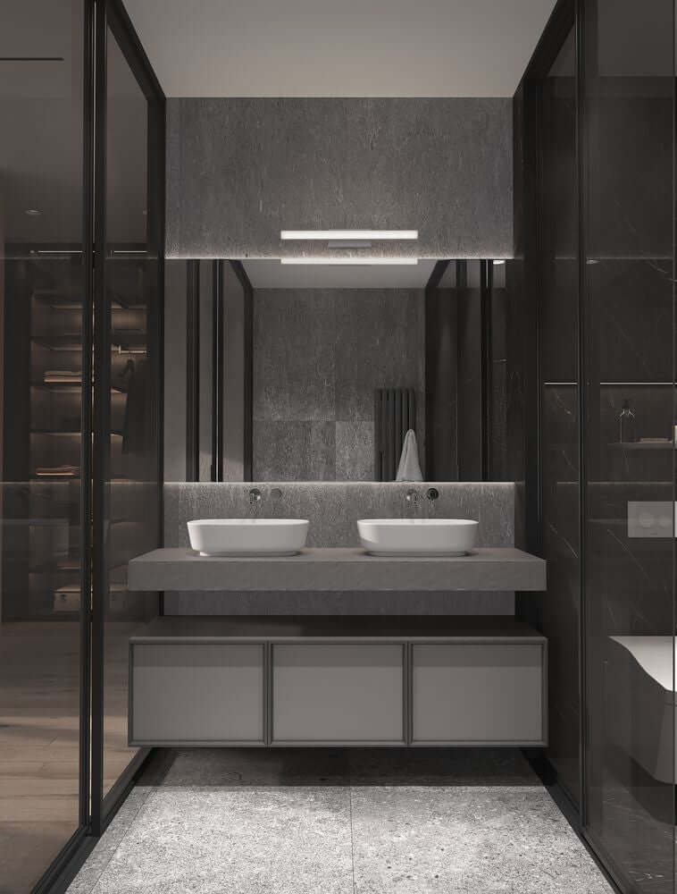 Willow LED Wandleuchte 3000K IP44 im modernen Badezimmer mit Doppelwaschbecken und grauem Marmor.