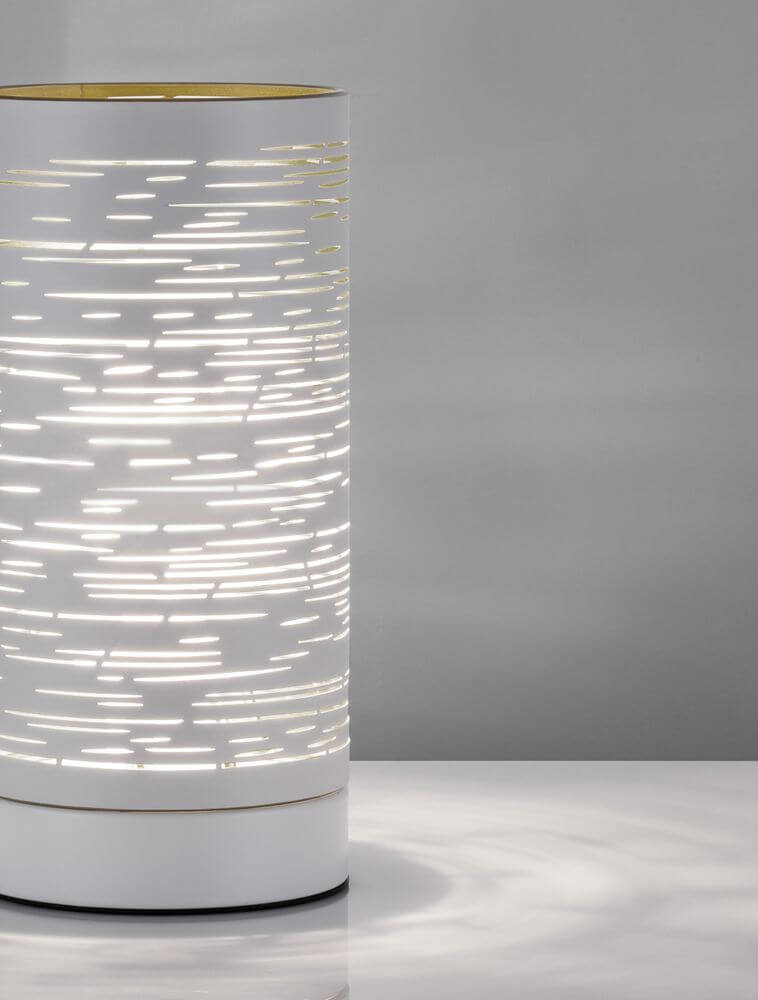 Zane Tischleuchte E14 Ø 10cm in modernem Design mit filigranen Lichtmustern.