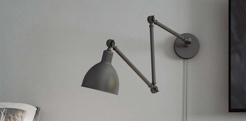 Schwenkbare Wandleuchte in modernem Design, ideal für stilvolle Innenräume.