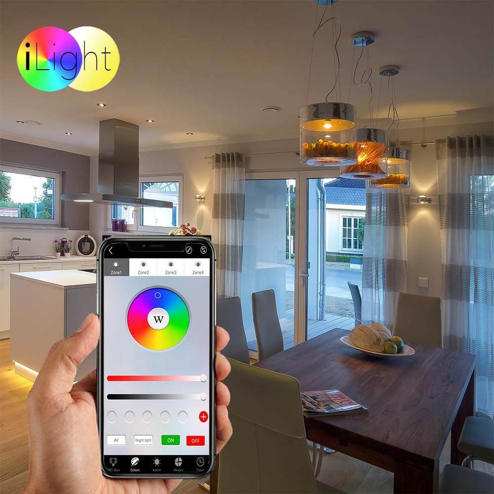Hand hält Smartphone zur Steuerung der iLight E27 LED RGBW Beleuchtung in modernem Essbereich.