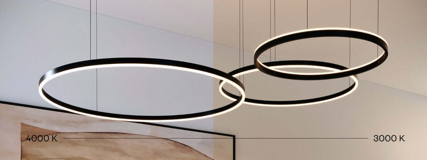 Moderne runde Hängelampe mit verschiedenen Farbtemperaturen, 3000 K und 4000 K, in stilvollem Raum.