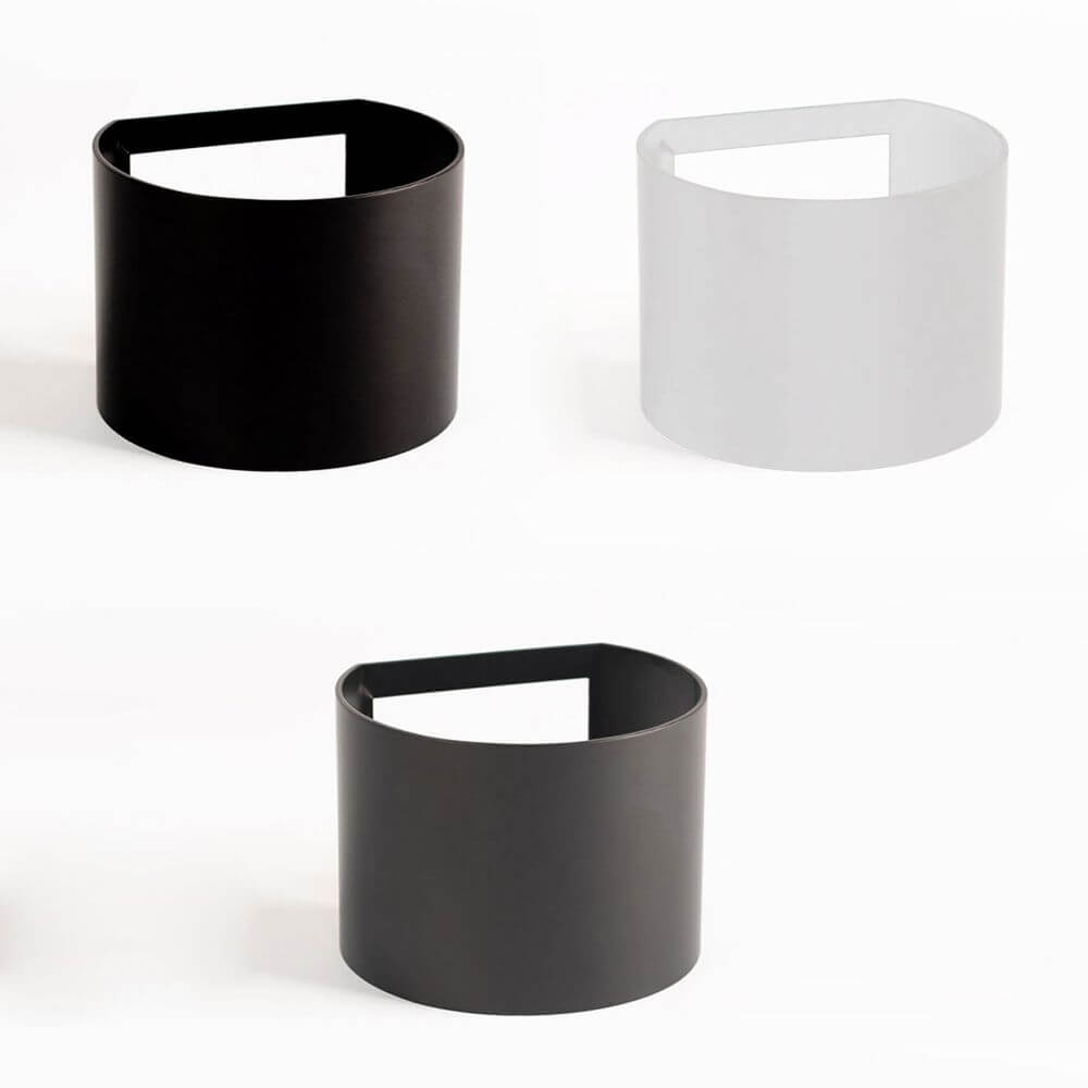 drei runde Abdeckungen in Schwarz und Weiß für die Ixa Wandleuchte von s.luce, modern und modular.