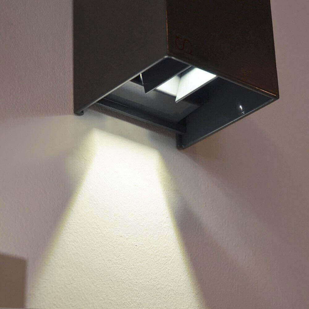 s.luce Ixa LED high power wall lamp IP20 with modern design and LED lighting mounted on the wall.