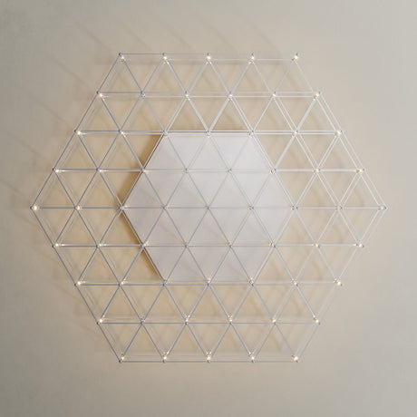 s.luce Atom eckige LED Effekt Wand- & Deckenleuchte im modernen, geometrischen Design an einer Wand