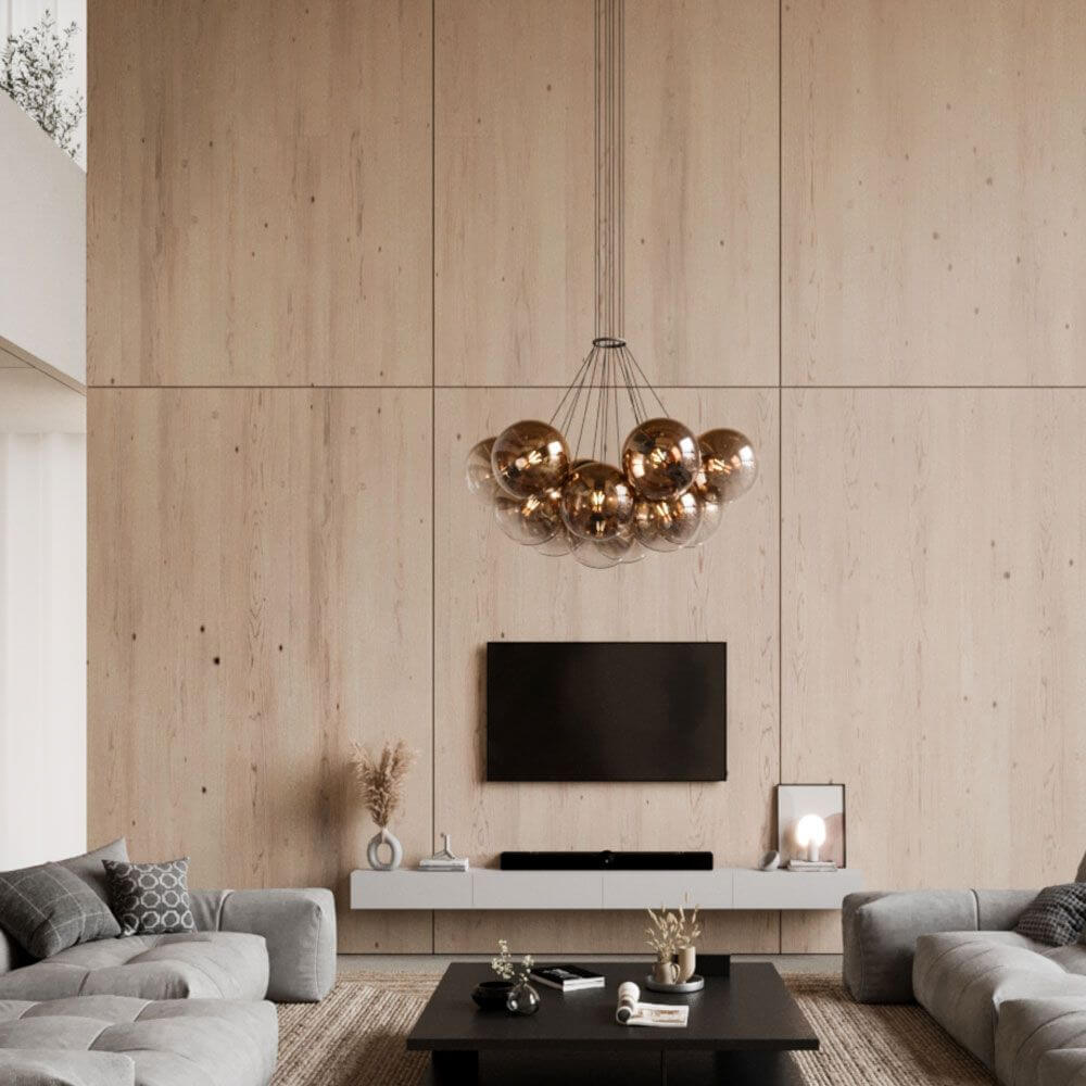 s.luce Combinizer Ring für mehrflammige Cluster-Pendelleuchten in einem stilvollen Wohnraum mit modernen Möbeln.