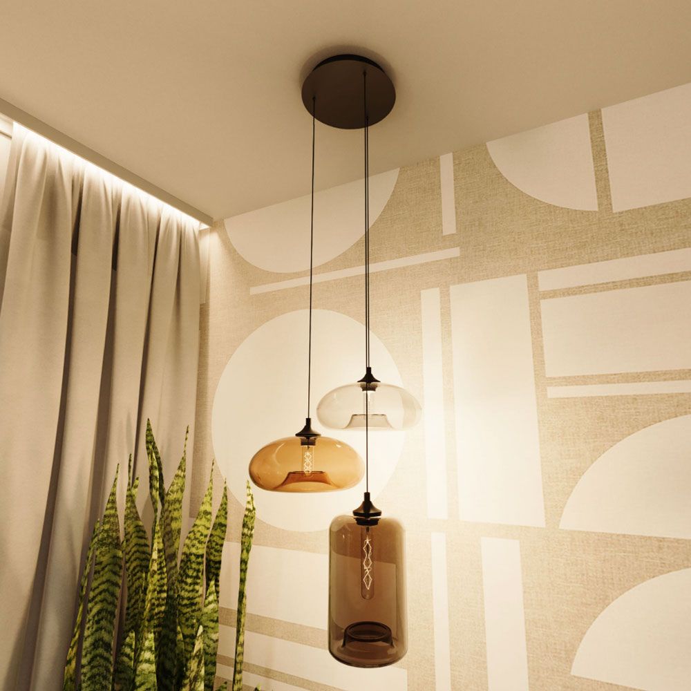 s.luce Cruet Pendelleuchte mit Glas, runde Formen in Amber und Klar für stilvolle Wohnraumbeleuchtung.