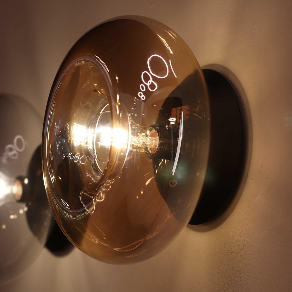 s.luce Cruet Glas Wand- und Deckenleuchte Up & Low in modernem Design mit schwarzer Basis und transparenter Glaskuppel.