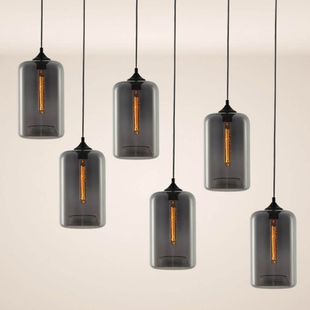 s.luce Cruet mehrflammige Hängeleuchte in stylischem Design mit transparenten Glaskörpern und Edison-Lampen.