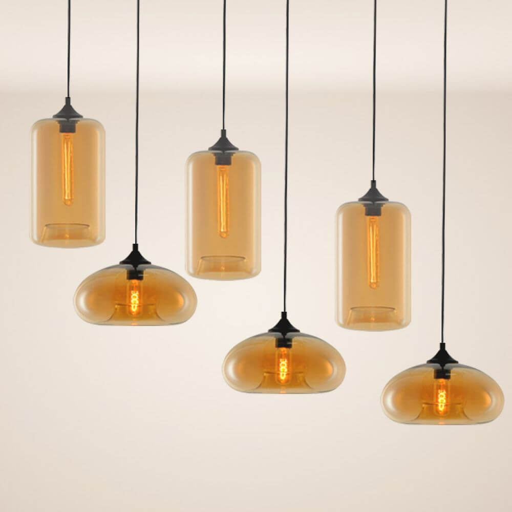 s.luce Cruet mehrflammige Hängeleuchte in modernem Design mit warmen Farbnuancen.