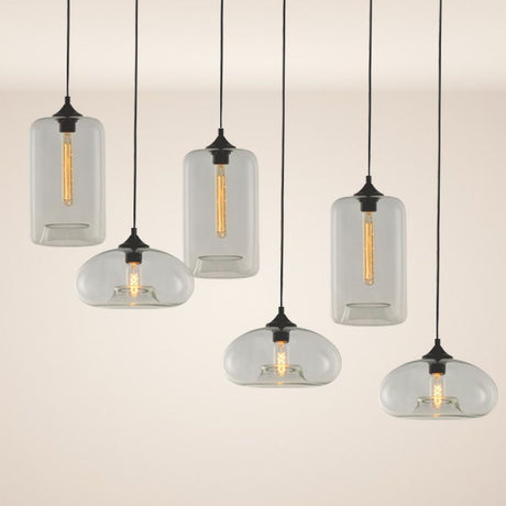 s.luce Cruet flerflammet pendellampe i moderne design med transparente glasskropper.