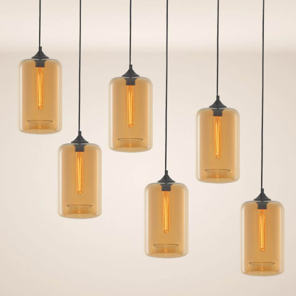 s.luce Lampa wisząca Cruet z wieloma źródłami światła w nowoczesnym designie z bursztynowymi szklanymi korpusami.