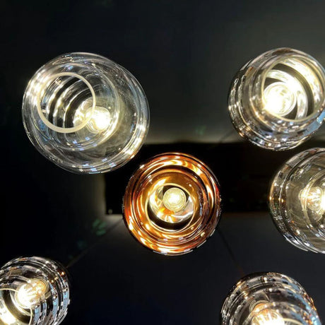 s.luce Echos Cluster Glas-Pendelleuchte 7-flammig 3x18cm aus der Vogelperspektive mit sanftem Licht