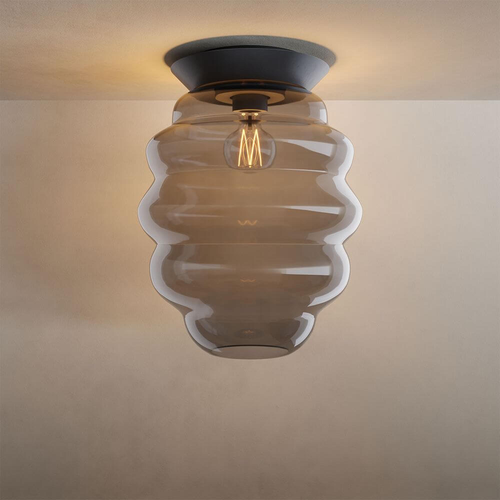 s.luce Echos Glas-Deckenleuchte in ovaler Form mit strukturierter Oberfläche und E27 Fassung, stilvolle Raumbeleuchtung.