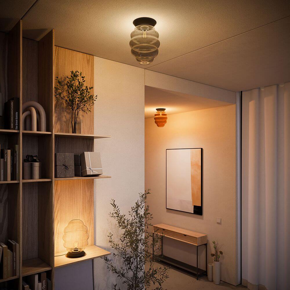 s.luce Echos Glas-Deckenleuchte E27 in modernem Wohnraum, stilvolles Design aus Glas und Licht, harmonische Beleuchtung.