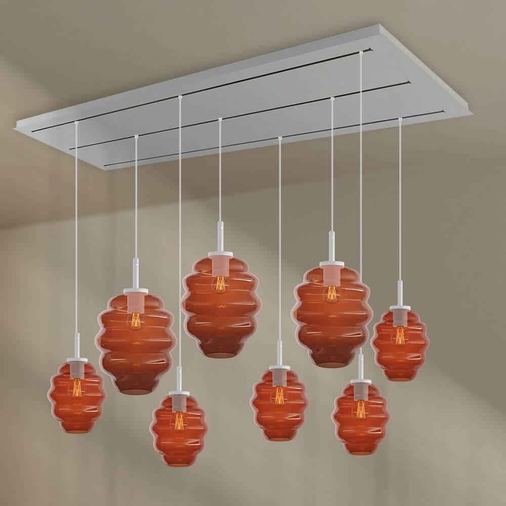 s.luce Echos Esstischlampe 8-flammig 200cm 3-reihig Ø 18/25cm mit eleganten orangen Glaskörpern.