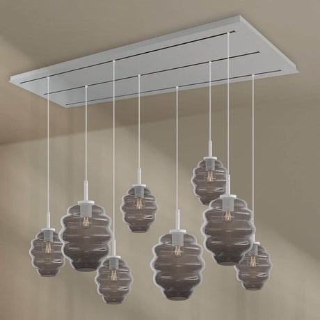 s.luce Echos Esstischlampe 8-flammig 200cm 3-reihig Ø 18/25cm mit eleganten Glaskörpern und moderner Anordnung.