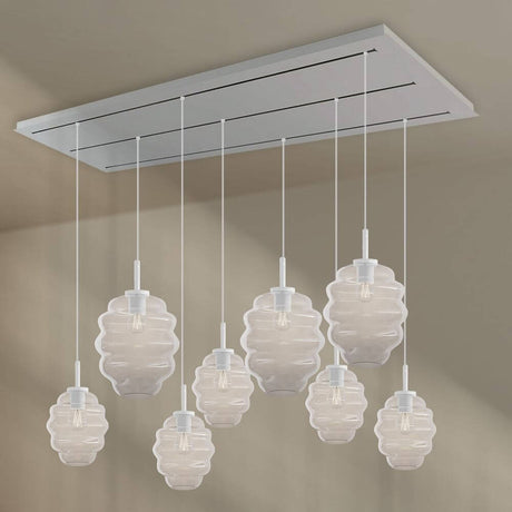s.luce Echos Esstischlampe 8-flammig 200cm 3-reihig Ø 18/25cm mit eleganten Glaskörpern in einem modernen Design.