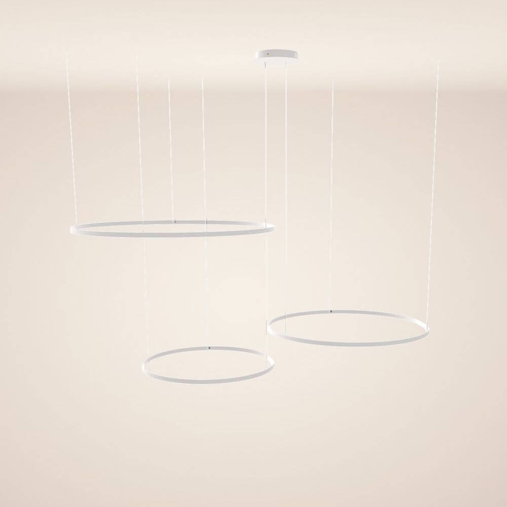 s.luce Lampa wisząca LED Ring 3-płomieniowa ekscentryczna w eleganckim układzie nad jasnym tłem.