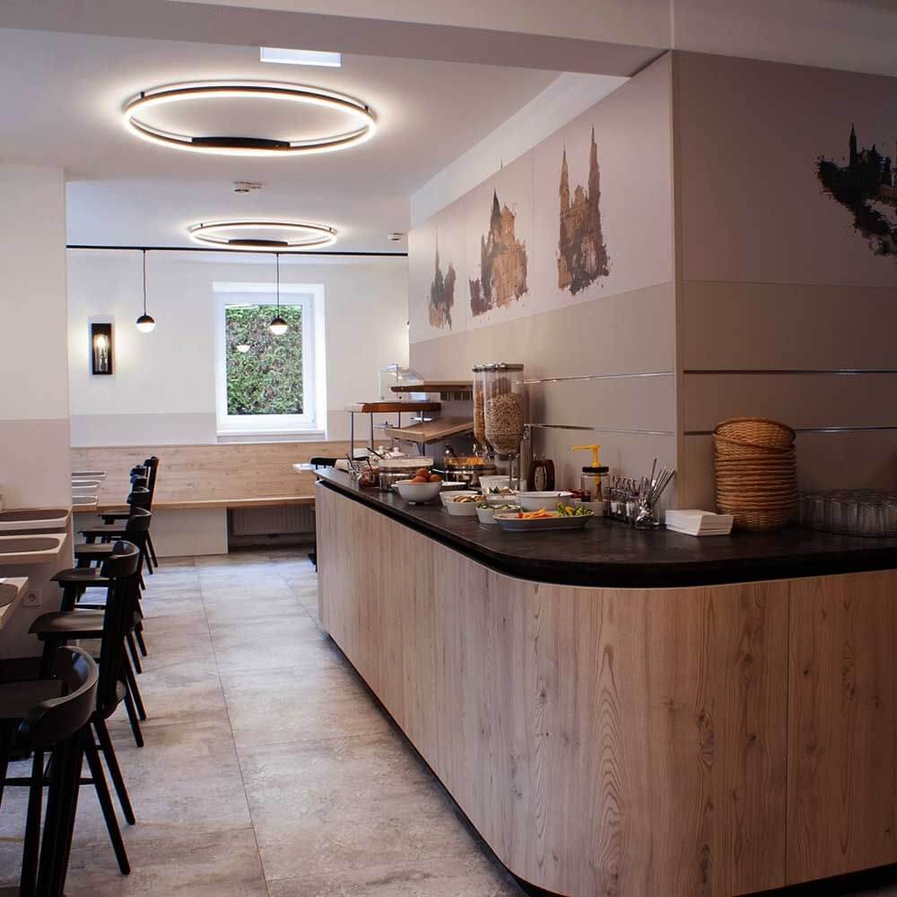 s.luce LED Ring Wandlamp & Plafondlamp Dimbaar modern rond in elegante keukenomgeving met heldere verlichting.