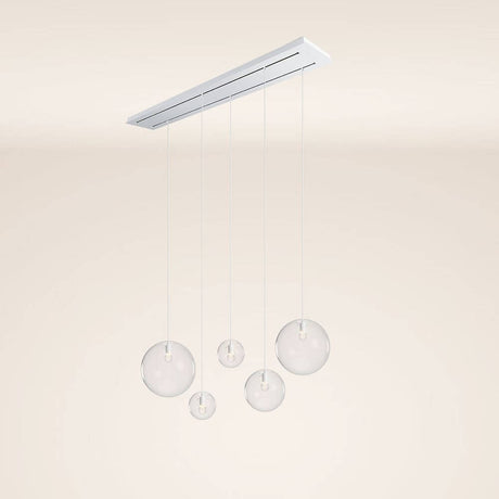 s.luce Orb 5-flammige Esstischlampe 2-reihig 160cm mit schwebenden Glaskugeln in modernem Design.