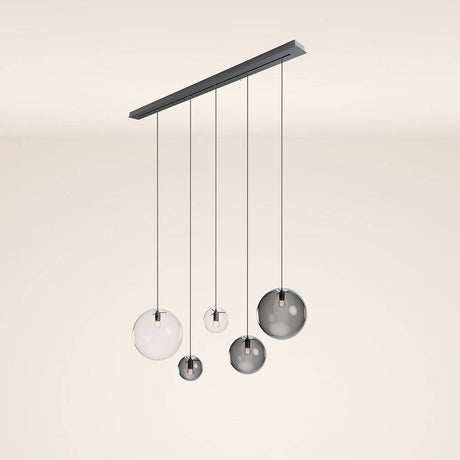 s.luce Orb Esstisch-Hängeleuchte 5-flammig 160cm in modernem Design mit verschiedenen Glaskugeln.