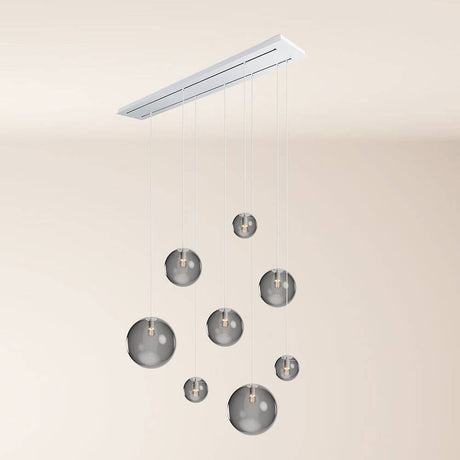 s.luce Orb Esstischleuchte 8-flammig 160cm 2-reihig hängend mit modernen Glaskugeln.