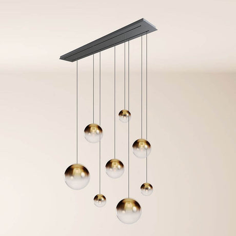 s.luce Orb Esstischleuchte 8-flammig 160cm 2-reihig mit schwebenden Glaskugeln.