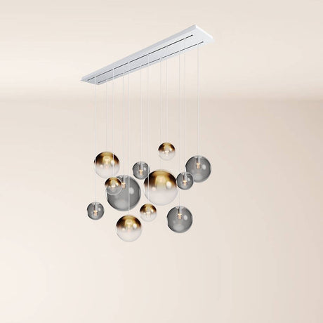 s.luce Orb Esszimmerlampe 12-flammig 160cm 2-reihig mit modernen, hängenden Glaskugeln in Gold und Grau.