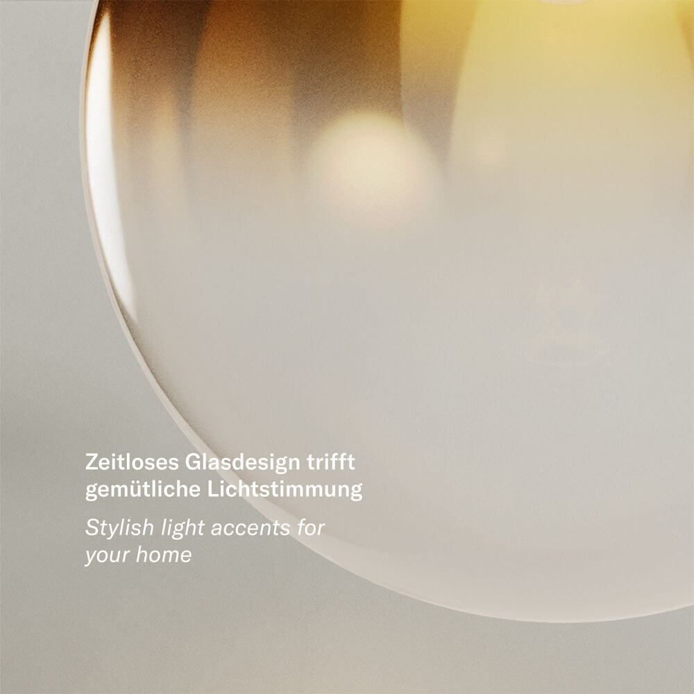 s.luce Orb Axis Glas-Tischlampe Dreibein 20cm mit elegantem Glaskugel-Design und stilvollem Lichtakzent.