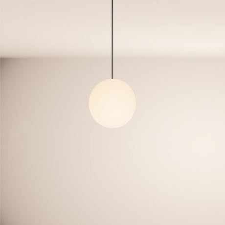 s.luce Orb glass ball pendant light in stylish design, floating from the ceiling.