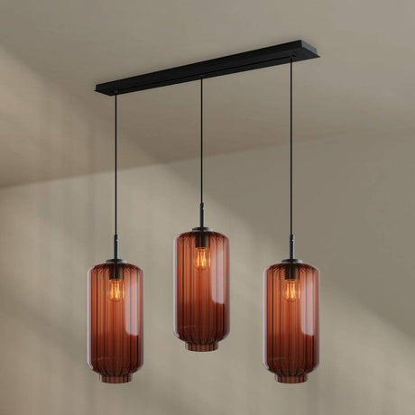s.luce Velo Esstisch-Pendelleuchte 3-flammig 120cm Ø 18cm in elegantem Design mit runden, braunen Glasleuchten.