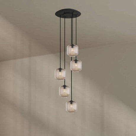 s.luce Velo 5-light gallery light Ø 60 cm canopy Ø 20 cm in a modern living space with glass pendants.