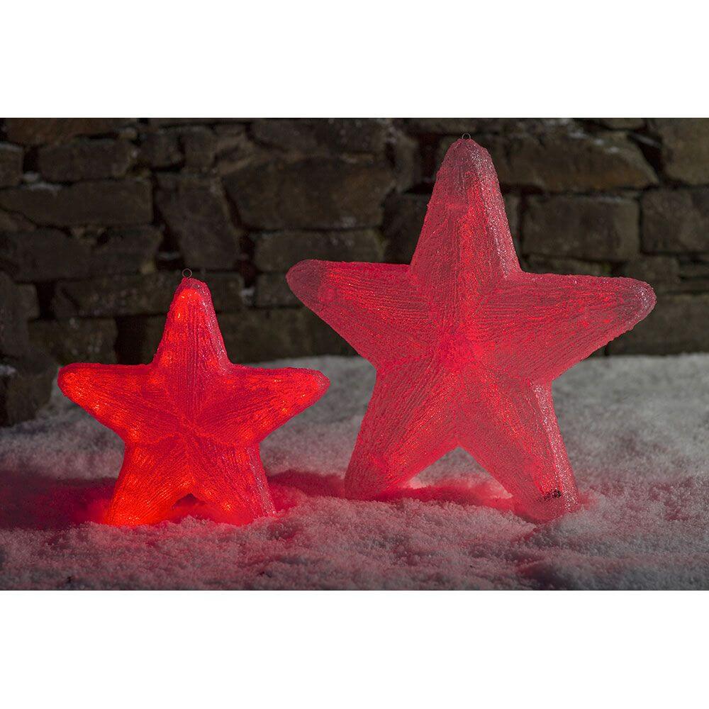 LED Acryl Stern mit 6 Farbwechselfunktionen 75 RGB Dioden 12V IP44 in roter Beleuchtung im Schnee.