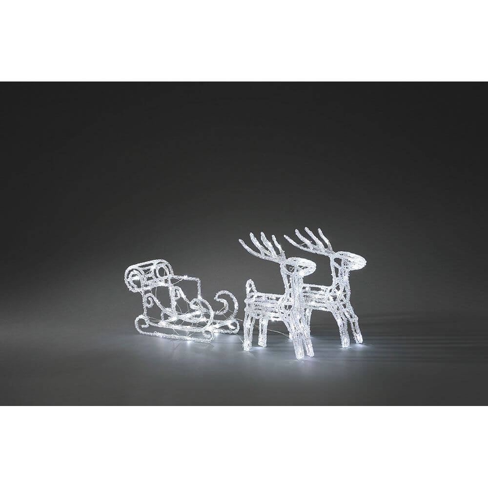 LED Acryl-Set Schlitten mit 2 Rentieren 96 Kaltweiße Dioden 24V auf dunklem Hintergrund