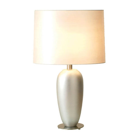 Bordlampe Sigma Oval keramikk-metall bladforsølvet-forkrommet med moderne design og mykt lys.