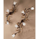 Deckenleuchte Campana 3-flammig Rost-Antik, Goldfarben mit dekorativen Rosen und Blätterdesign.