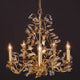 Hängeleuchte 5-flammig Buono Medium Eisen Gold mit eleganten Glaskristallen und goldenen Details.